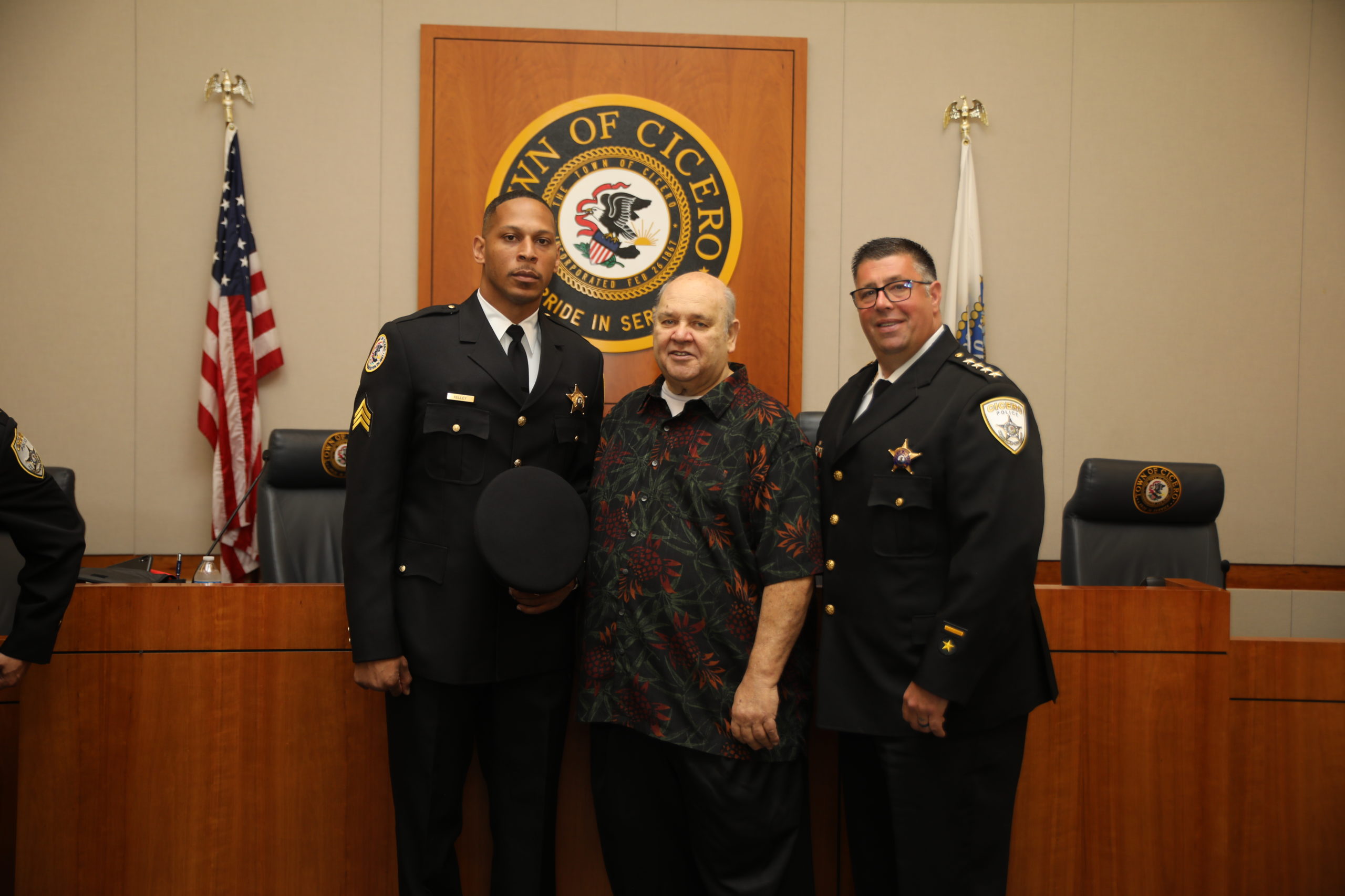 Sgt. Steven Kelly with Cicero President Larry Dominick and CIcero Police Chief Jerry Chlada