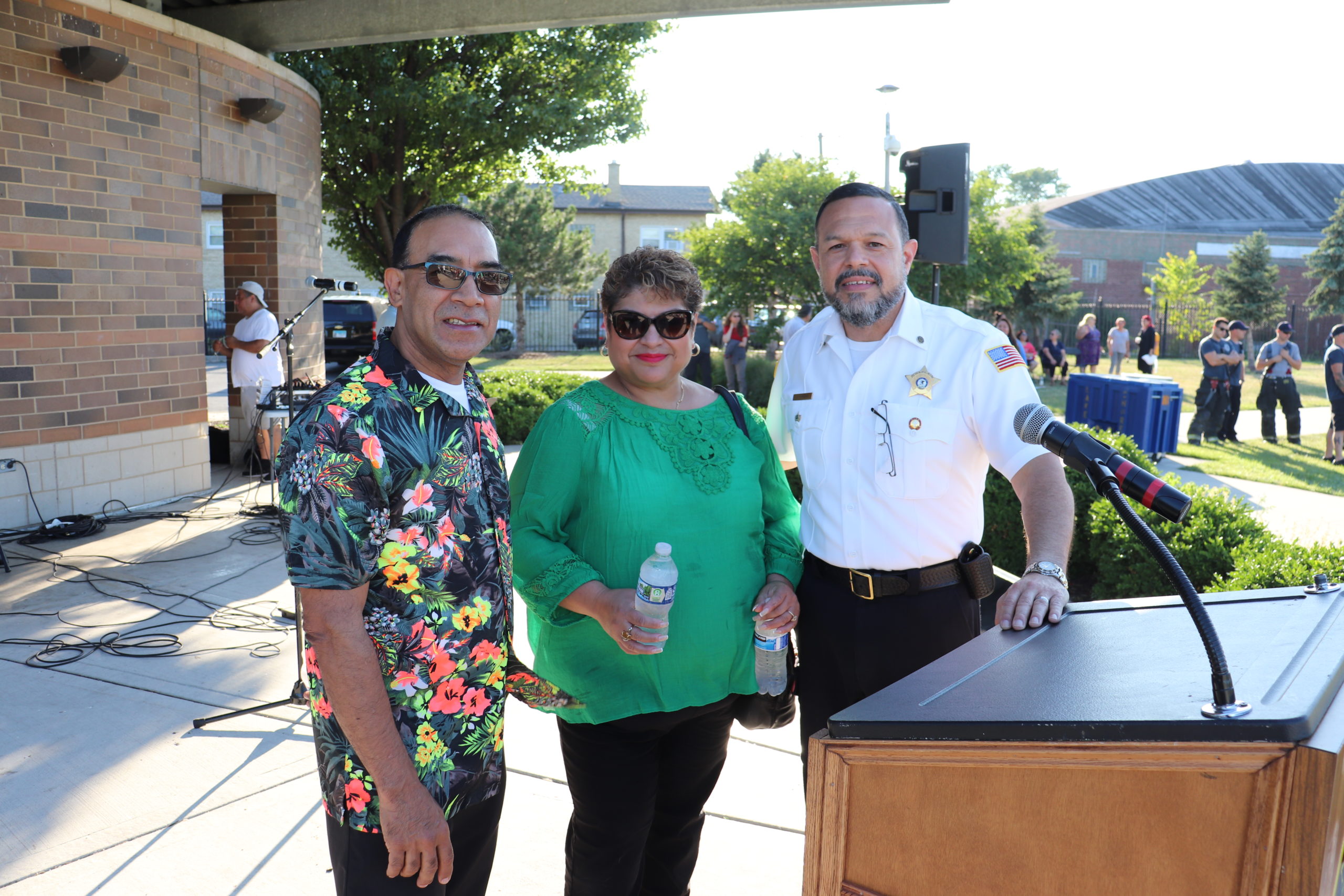 Cicero Trustee Victor Garcia and Clerk Maria Punzo-Arias pose with Cicero Chaplain Ismael Vargas at Cicero’s annual Prayer Day celebration held at Cicero Community Park on July 14, 2022