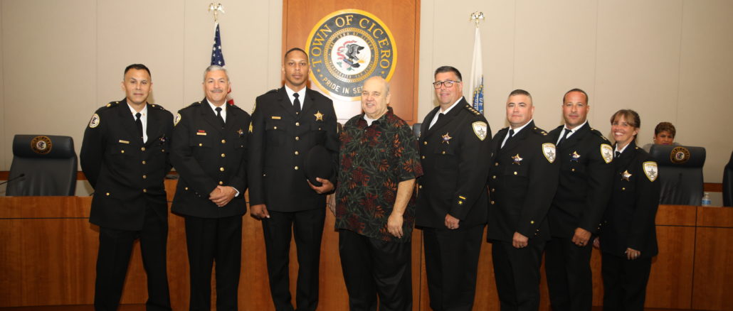 Town President Larry Dominick poses with members of the Cicero Police Department including newly promoted Sgt. Steven Kelley (3rd from Left) and Cicero Police Chief Jerry Chlada.