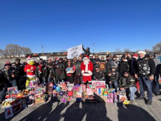 Cicero officials join volunteers from local motorcycle clubs to collect toys to donate to needy children and families
