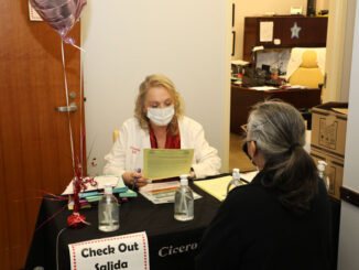 Health Commissioner Sue Grazzini discusses health issues with participants at the Cicero Healthy Hearts event which was held on February 14, 2023