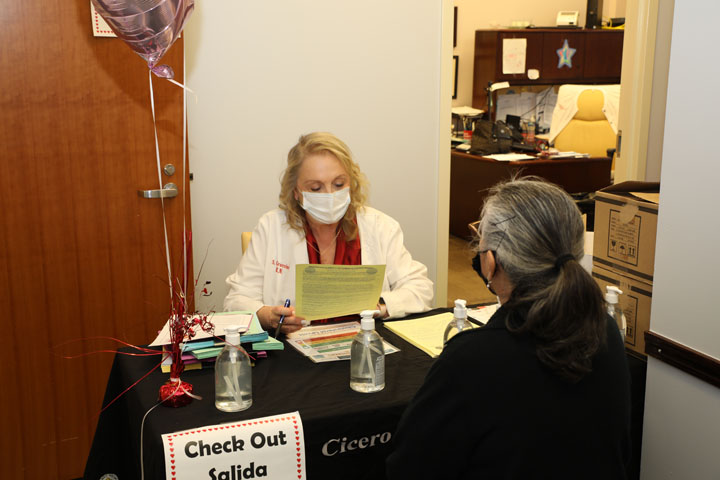 Health Commissioner Sue Grazzini discusses health issues with participants at the Cicero Healthy Hearts event which was held on February 14, 2023