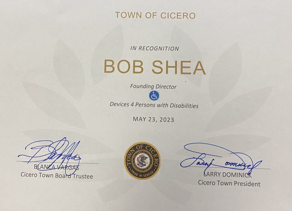 Town President Larry Dominick and the Town of Cicero Board of Trustees presented a Certificate of Appreciation to Bob Shea founding director of the "Devices 4 Persons with Disabilities."