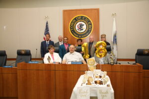 The board attendees were treated with cup cakes at the May 9, 2023 board meeting saluting President Larry Dominick's 18 year of service as Town President