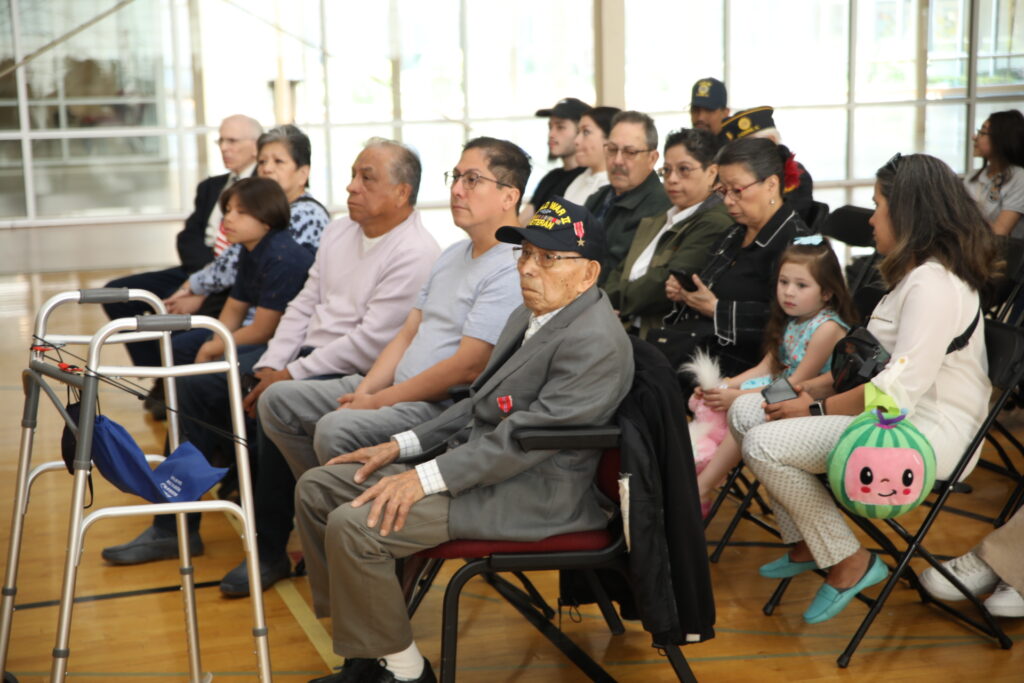 Veteran Benito Morales with members of his family at Armed Forces Day celebration at the Town of Cicero May 24, 2023