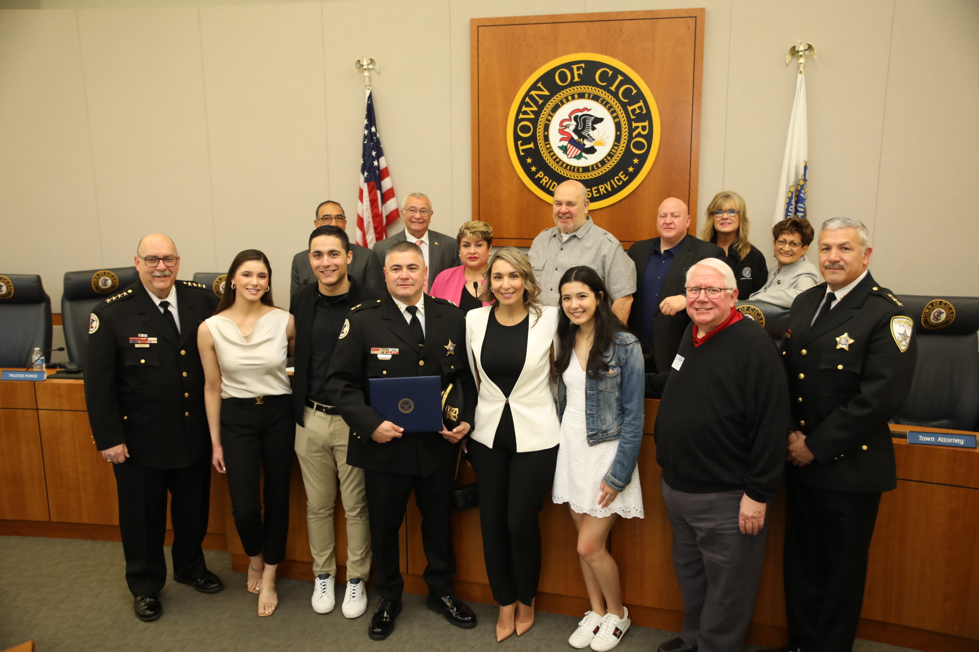 Dep. Superintendent Frank Diaz with Town officials and family at the April 28 board meeting where he was recognized for his service in the U.S. Military Reserves