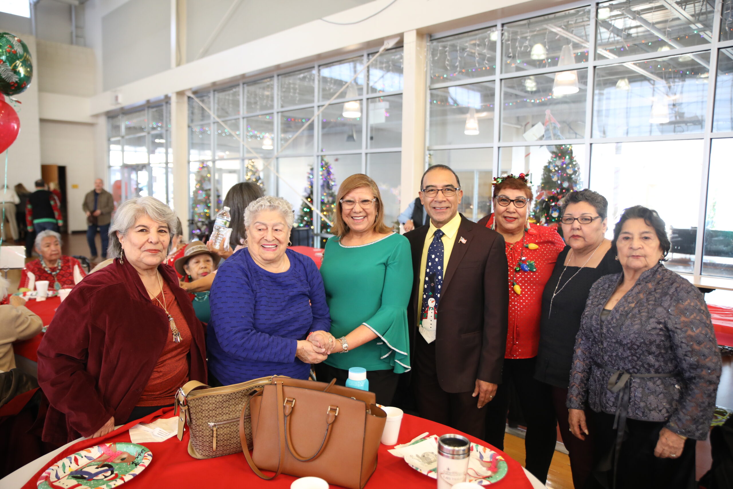 Trustee Victor Garcia with Seniors at the Senior Christmas celebration Dec. 13, 2023