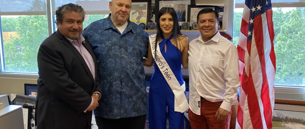 Town President Larry Dominick and Cook County Commissioner Frank Aguilar greet Miss Teen 2024 competitor Emily Apango and her father.