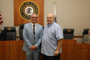 Cicero Town Attorney Michael T. Del Galdo with Cicero Town President Larry Dominick after receiving a proclamation honoring the 25th Anniversary of his law firm.